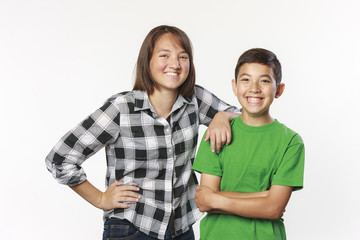 Brother and sister in studio photo.