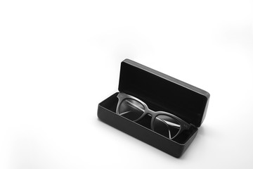 Sunglasses in a case, leather box packaging white isolated background