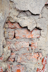 old decaying wall. old brick broken wall. Ruin. Urban backyard. Poverty. War.