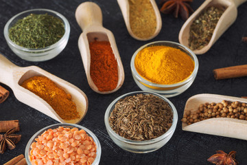 Spices, herbs and food additives on a dark background