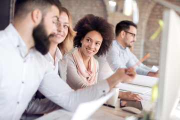 Business people discussing the charts and graphs