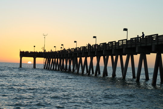 fishing pier in Venice Florida at sunset