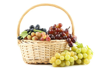 Grapes in basket isolated on white background