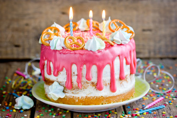 Birthday naked cake with pink chocolate smudges