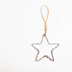 Fototapeta premium Christmas decoration, star on a string