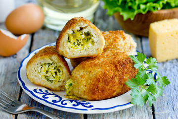 Chicken cutlets with cheese, egg, parsley, butter filling. Traditional russian food zrazy