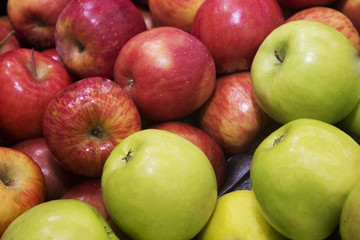 Bunch of red and green apples close up
