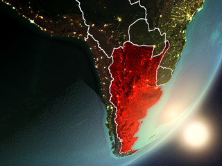 Sun rising above Argentina from space