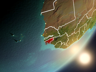 Sun rising above Guinea-Bissau from space