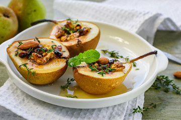Baked pears with nuts.