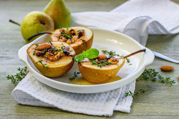 Baked pears with nuts.