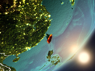 Sun rising above Taiwan from space