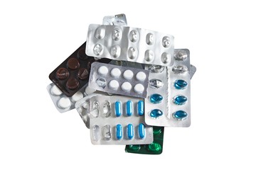 Drugs for colds and flu, home treatment with pills, medications in packages on white isolar background