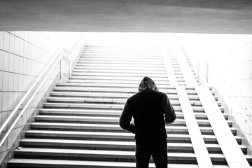 B&W man and ladder