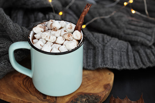 Hot Cocoa with Marshmallows and Cinnamon Stick
