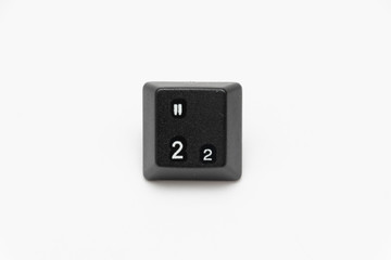 Single black keys of keyboard with different letters 2