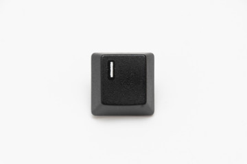 Single black keys of keyboard with different letters I