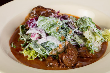 Beef with iceberg salad