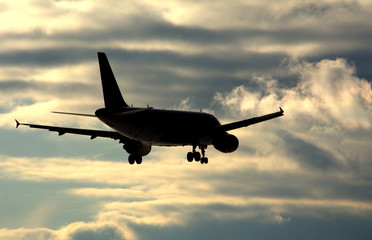 Airplane in sunset