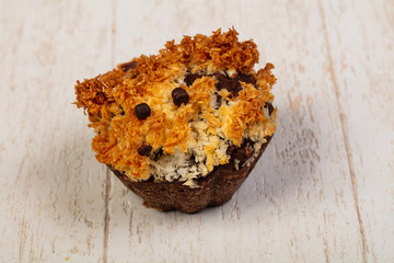 Tasty muffin over wooden