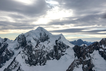 Fototapeta na wymiar Snow capped peaks of the Southern Alps