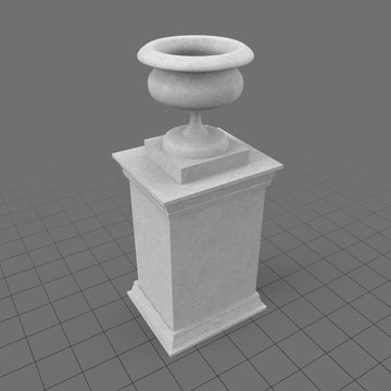 Stone urn on pedestal