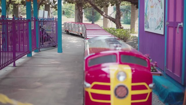 Empty mini train ride at toddler amusement park