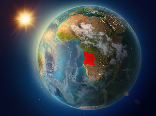 Naklejka na ściany i meble Angola with sunset on Earth