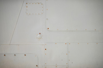 Old detail of a military aircraft, metal texture