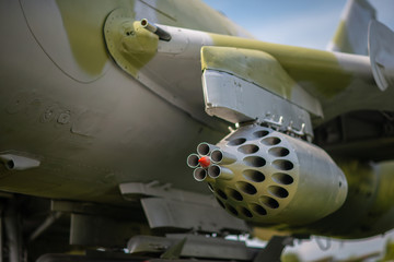 Missiles on the wing of an old military aircraft