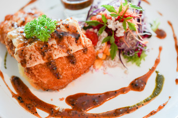 Homemade chicken fried steak with fresh healthy salad