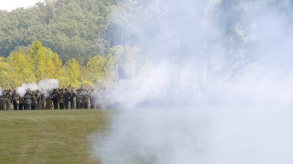 Confederates Firing Rifles in Battle