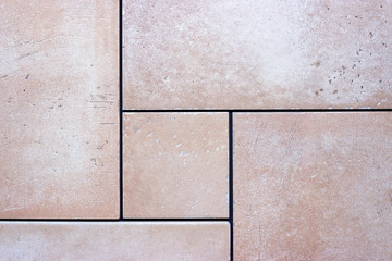 Close up of a surface of ceramic tiles floor; texture background