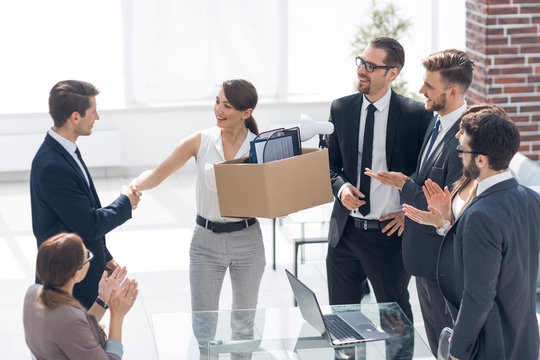 project Manager and new employee shaking hands