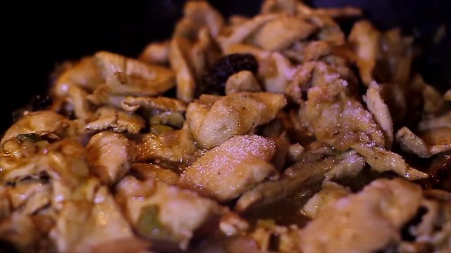 Seasoning the chicken