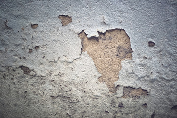 Vintage wall with cracked plaster