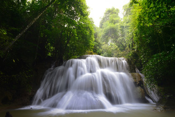  Waterfall in deep forest  Huai  Mae Khamin Waterfall  , Kanchanaburi  Thailand is popular with waterfall tourists . 