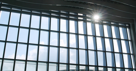 Airport window with sunlight flare