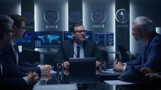 Secretary Delivers Good News to a Board of Directors Meeting, Everybody Present Applaud. Serious Business People Have Successful Day on the Stock Market.