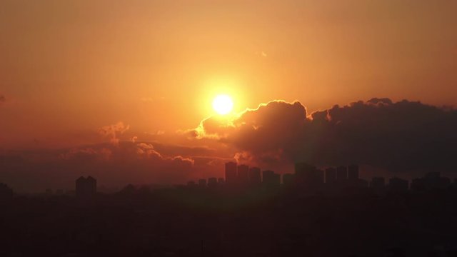 Timelapse sunset on the cloudy sky, beautiful view