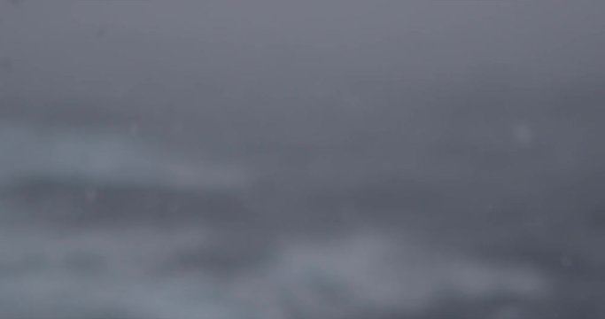 Slow motion imagery of crossing the Drake Passage to Antarctica in a storm. A dramatic scene with heavy wind and big waves. Shot in 4k with RED Epic Dragon.