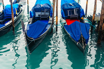 Fototapeta na wymiar Rows of traditional wooden gondolas