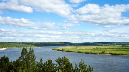 View of Tom River and cloudy sky