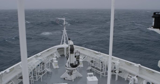 Slow motion imagery of crossing the Drake Passage to Antarctica in a storm. A dramatic scene with heavy wind and big waves. Shot in 4k with RED Epic Dragon.