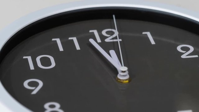 time lapse of clock showing at noon 
