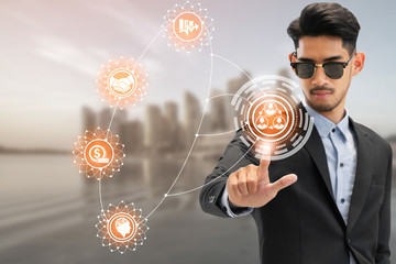 Businessman using future graphic interface.