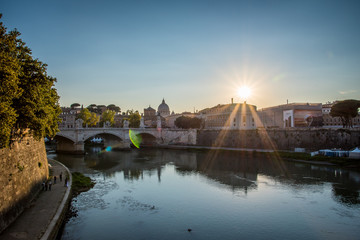 Fototapeta premium Framed Sunset over Tiber River in Rome 