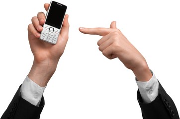 Person holding up and pointing at a cell phone