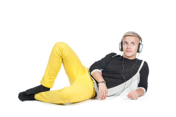 Obraz premium Man in headphones lying down