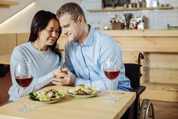 Wonderful evening. Lovely cute couple enjoying an evening while relaxing in a cafe